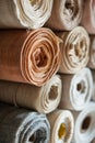 Close-up of various rolls of multicolored fabric stacked Royalty Free Stock Photo