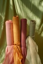 Close-up of various rolls of multicolored fabric stacked Royalty Free Stock Photo