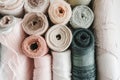 Close-up of various rolls of multicolored fabric stacked Royalty Free Stock Photo