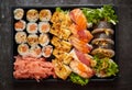 Close up of Various sushi set in black plastic delivery box. Top view Royalty Free Stock Photo