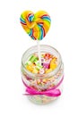 Various sweety candies and lollipop in glass jar Royalty Free Stock Photo