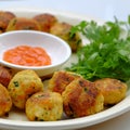 Close up vegan food, fried tofu ball in yellow for vegetarian meal Royalty Free Stock Photo