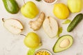 Close up of vegan healthy FODMAP diet food. Organic fruits, vegetables, greenery in yellow and green colors Royalty Free Stock Photo