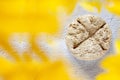 Close up vegetable-based halva sweet seeds prepared unfocused yellow sunflower copy space background.