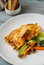 Close-up of vegetable omelette served with asparagus and carrots Royalty Free Stock Photo