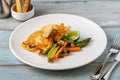 Close-up of vegetable omelette served with asparagus and carrots Royalty Free Stock Photo