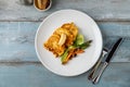 Close-up of vegetable omelette served with asparagus and carrots Royalty Free Stock Photo