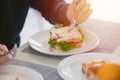 close up vegetable sandwich people eating healthy meal on morning lunch table Royalty Free Stock Photo