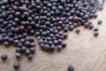 Close up vegetable seeds on wood background