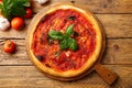 top view vegetarian tomato pizza marinara on chopping board Royalty Free Stock Photo