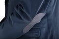 Close-up velvet navy blue mens blazer, isolated over white.