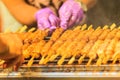 Close up the vendor grilling pork satay, Thai steak roasted pork Royalty Free Stock Photo