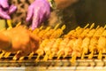 Close up the vendor grilling pork satay, Thai steak roasted pork Royalty Free Stock Photo