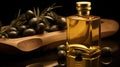 Close up of a very luxurious high quality olive oil or golden liquid in a gourmet crystal bottle presented with some olives