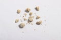 Flat lay or top view very small kidney stones at white background Royalty Free Stock Photo