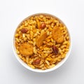 Close up of very spicy sweet Fatafat Bhel mixture Indian namkeen snacks on a ceramic white bowl.