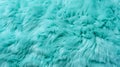 Close up of a vibrant blue texture of soft fur with various shades of emerald. Dyed animal fur. Concept is Softness Royalty Free Stock Photo