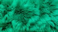 Close up of a vibrant green texture of soft fur with various shades of emerald. Dyed animal fur. Concept is Softness Royalty Free Stock Photo