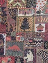 Close up of vibrant patterned handmade cloth with African tribal motifs