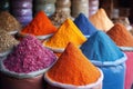 close-up of vibrant spice piles in a market