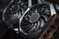 close up of video card with two coolers on dark background. concept computer harware