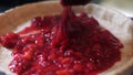 Pour Strawberry Jam into the Pie Crust