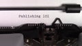 The words `Publishing 101 ` being typed on a typewriter