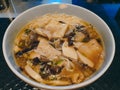 Close up of Vietnamese vegan noodles in broken bowl,vegetarian bowl with ,noodle,tofu, mush room, spice power.