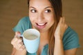 Close up view from above of woman drinking almond milk lactose-free beverage. Girl drinks organic soy based or nut milk drink as