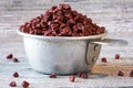 Achiote Seeds in a Measuring Cup