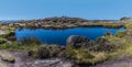 A close up view across Doxey Pool on the summit of the Roaches escarpment, Staffordshire, UK Royalty Free Stock Photo