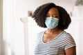 Close up view of an African American woman wearing a face mask Royalty Free Stock Photo