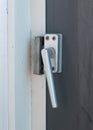 Close up view of aluminum door window handle Royalty Free Stock Photo