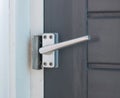 Close up view of aluminum door window handle Royalty Free Stock Photo