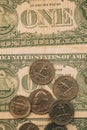 Close up view of American dollar bills and coins as background. Heap of American dollars for design.