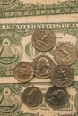 Close up view of American dollar bills and coins as background. Heap of American dollars for design. Royalty Free Stock Photo