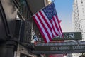Close-up view of American flag on building of theater on Broadway. New York. USA..