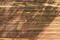 Close-up view of ancient brown wooden background texture. Shabby brown wooden planks. Aged wooden planks. Abstract background