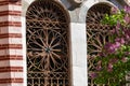 Crop view of architecture detail - antique wrought iron window