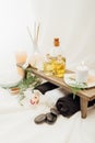 close up view of arrangement of spa treatment accessories with essential oil, salt and candle Royalty Free Stock Photo