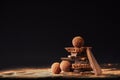 close up view of arrangement of truffles and chocolate bars with cocoa powder