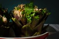 A close up view of artichokes filled with tuna and parsely Royalty Free Stock Photo