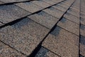 Close up view on Asphalt Roofing Shingles Background. Roof Shingles - Roofing.