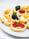 assorted fish roe mini sandwiches on plate Royalty Free Stock Photo