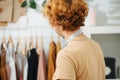 Girl tailor with measuring tape around her neck