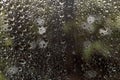 Close-up view of background texture, many rain drops outside the rear window of a car Royalty Free Stock Photo