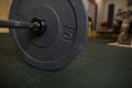 Close up view of barbell on floor in gym Royalty Free Stock Photo