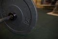 Close up view of barbell on floor in gym Royalty Free Stock Photo