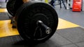 Close up view of barbell on floor in gym. Barbell falls to the floor after exercise. Barbell. Disassembled barbell on Royalty Free Stock Photo