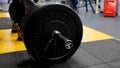 Close up view of barbell on floor in gym. Barbell falls to the floor after exercise. Barbell. Disassembled barbell on Royalty Free Stock Photo